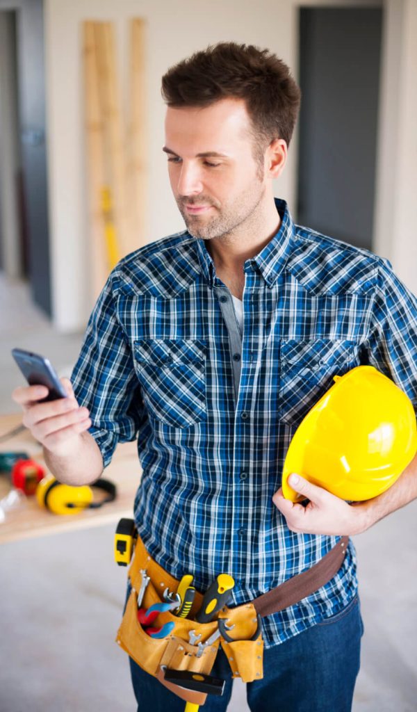 Construction Worker Using Mobile Phone